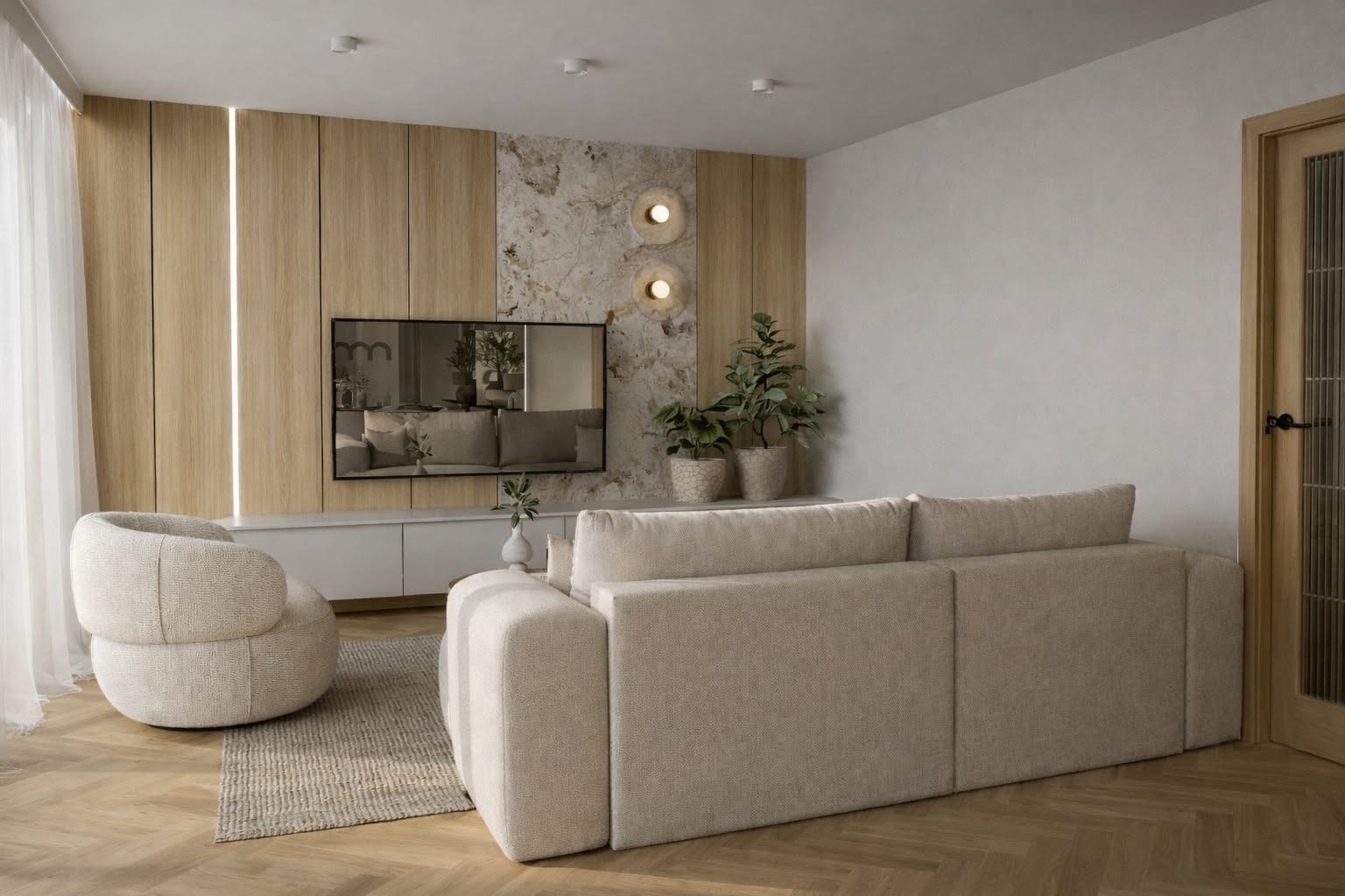 Jasna sofa i obły fotel na tle zabudowy w odcieniu drewna i dekoracyjnego kamiennego wzoru.